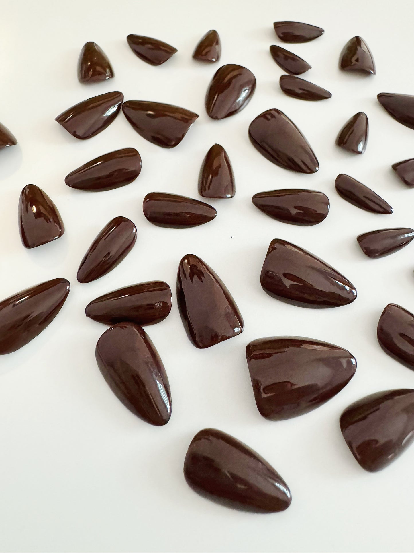 Chocolate brown, short to medium length, almond shaped press on nails.