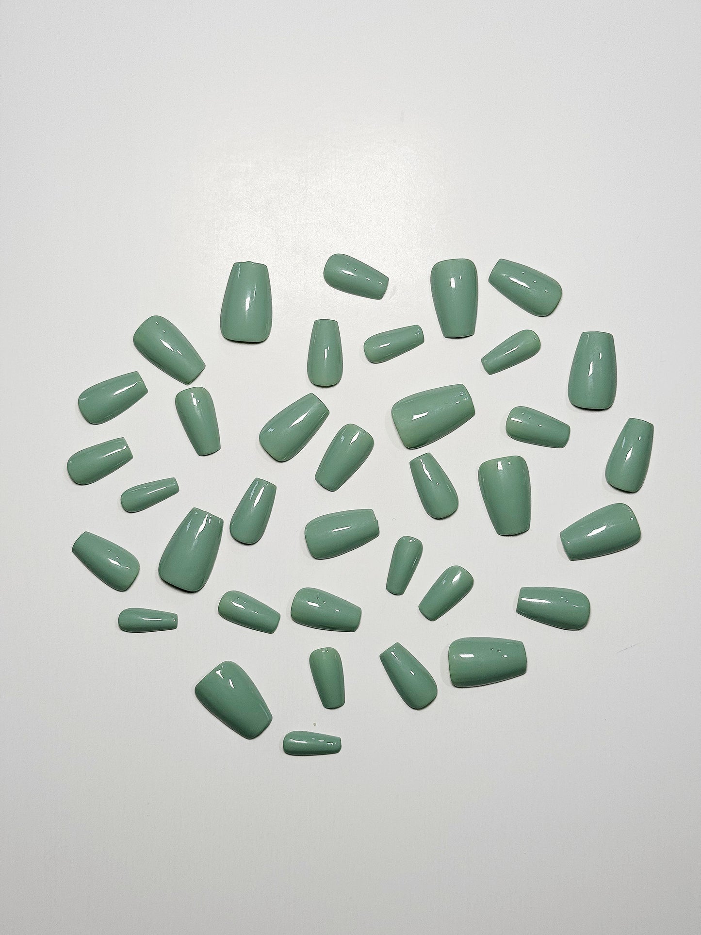 Sage green, medium length, coffin shaped press on nails.