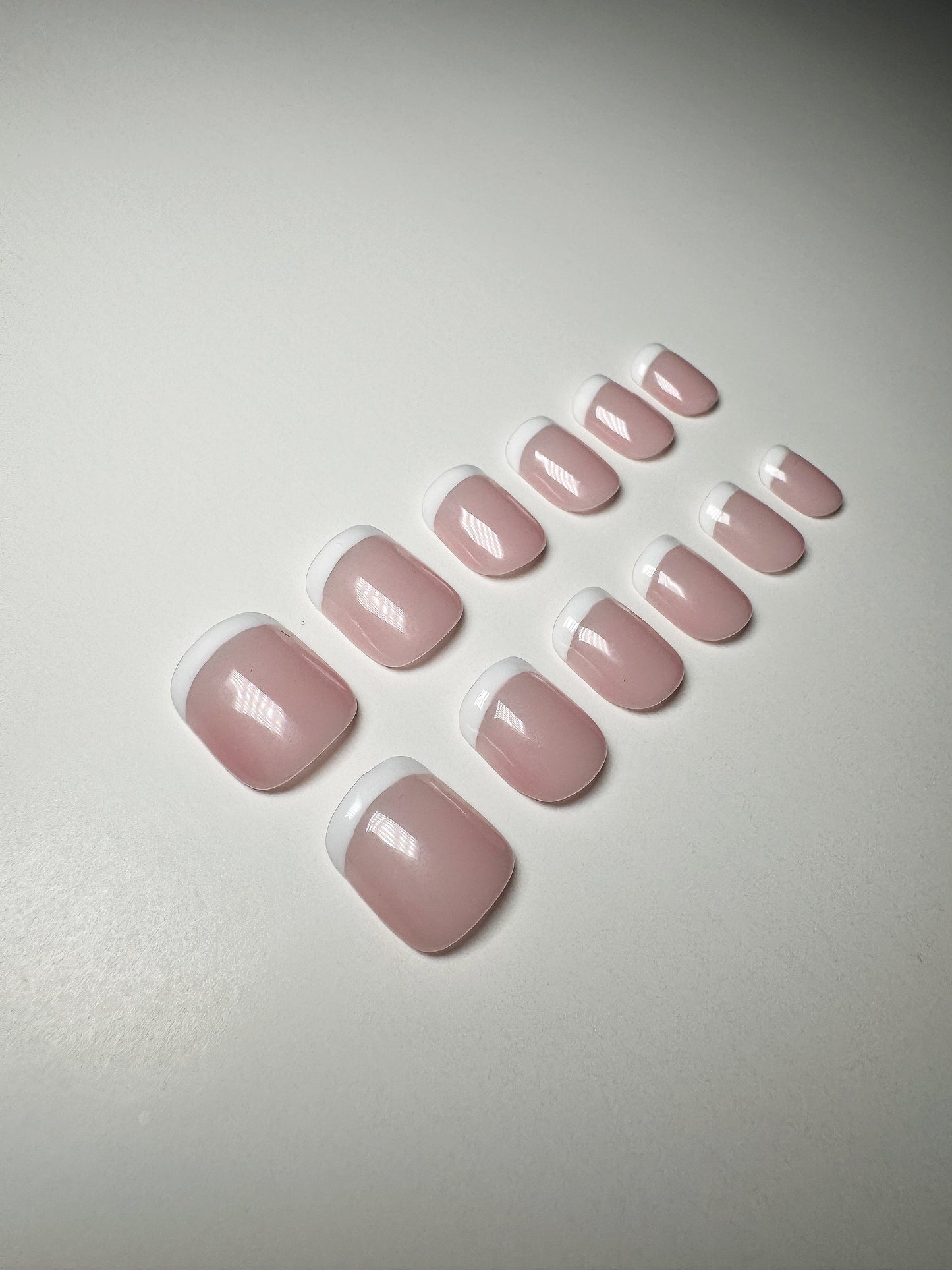 Classic white French manicure, extra short length, square shaped press on nails.