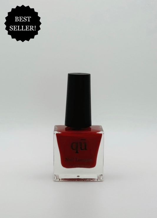 Classic crimson red nail polish.