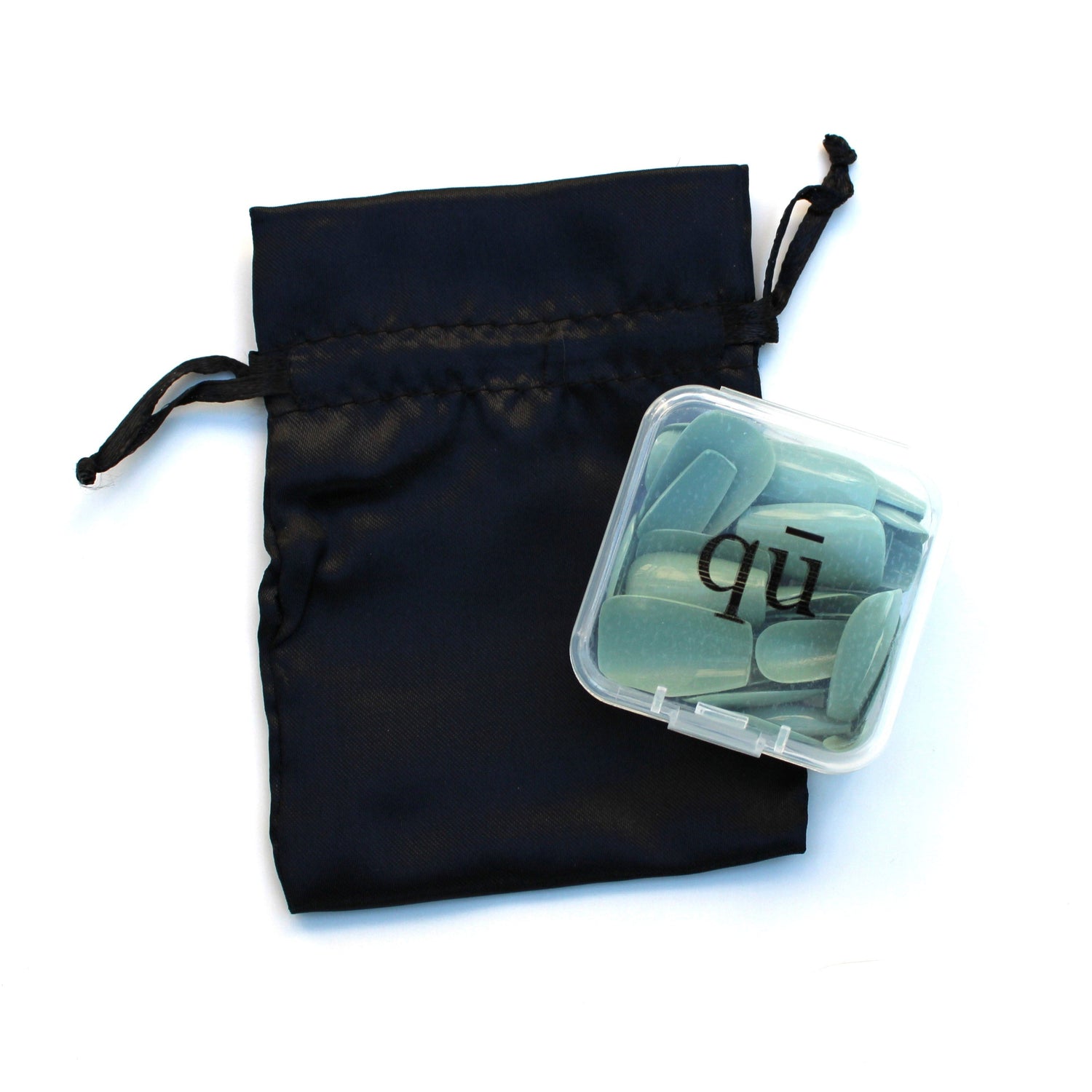 Black satin reusable drawstring bag with sage green luxury press on nail product inside on a white background