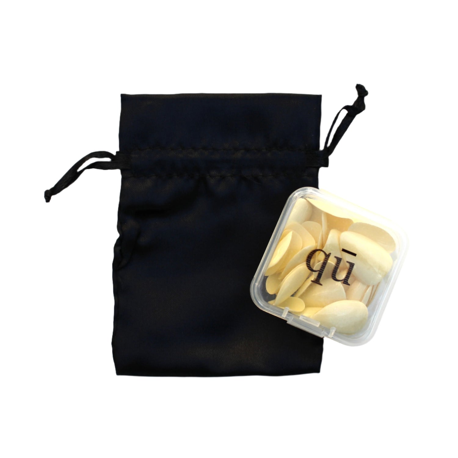Black satin reusable drawstring bag with butter yellow luxury press on nail product inside on a white background
